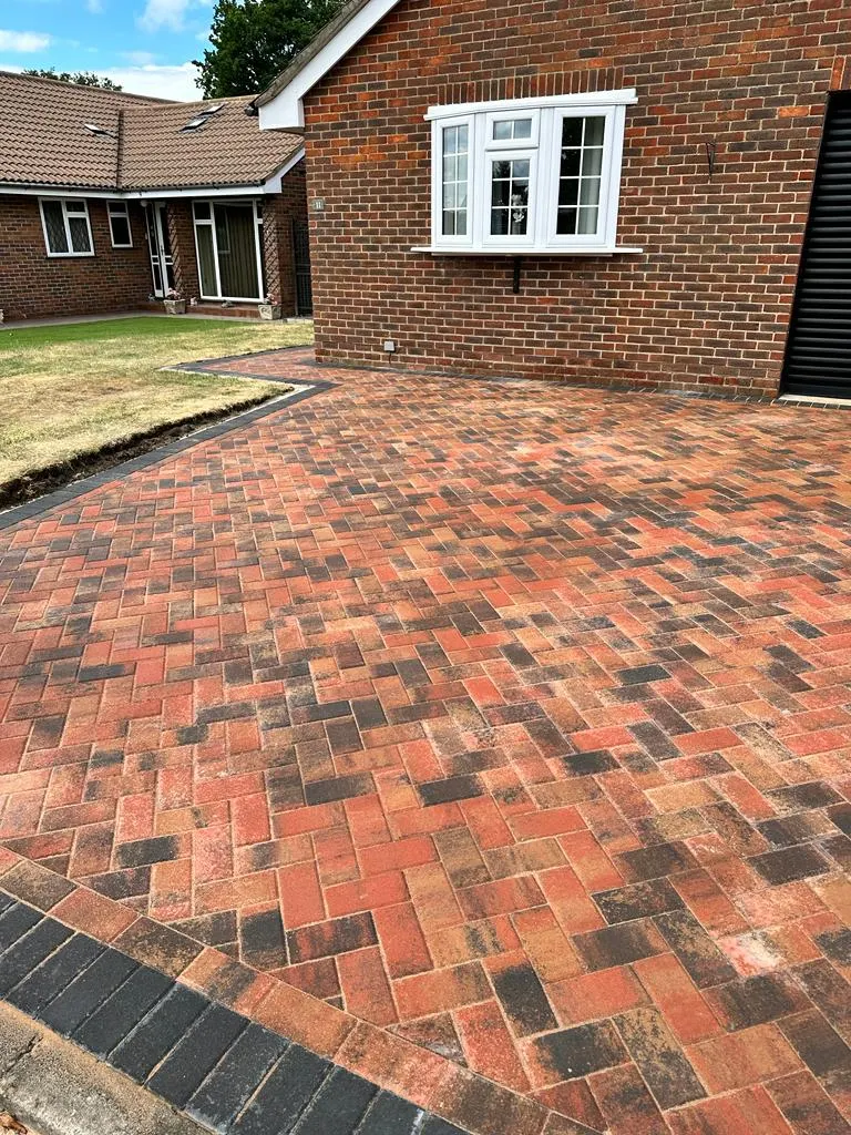 Herringbone block paving driveway with a soldier course perimeter