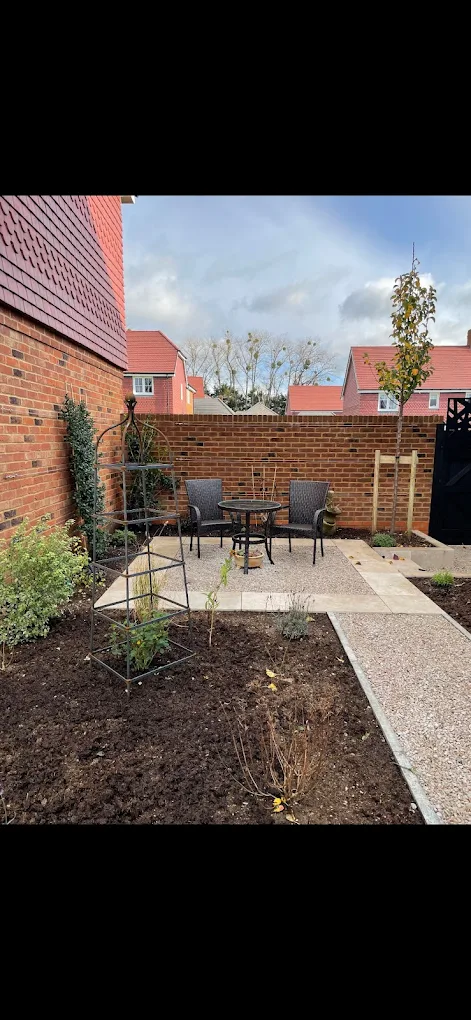 Porcelain patio steps set between planted beds