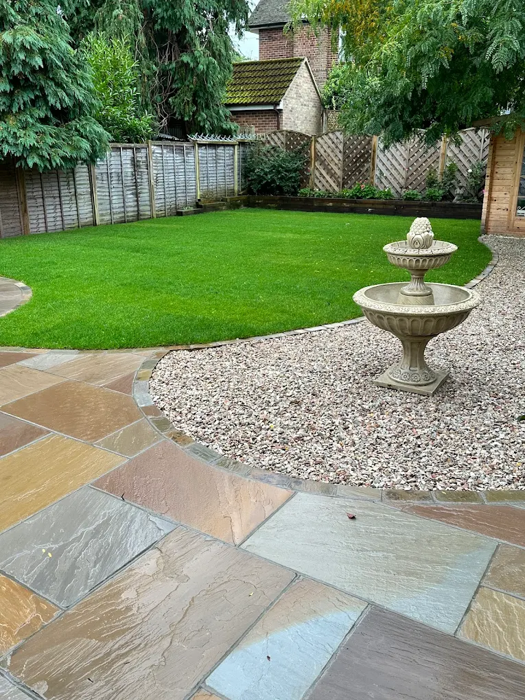 Sandstone patio laid out as a garden seating area